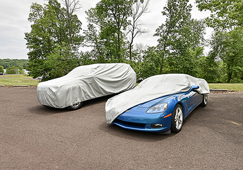 image of corvette and SUV with car covers